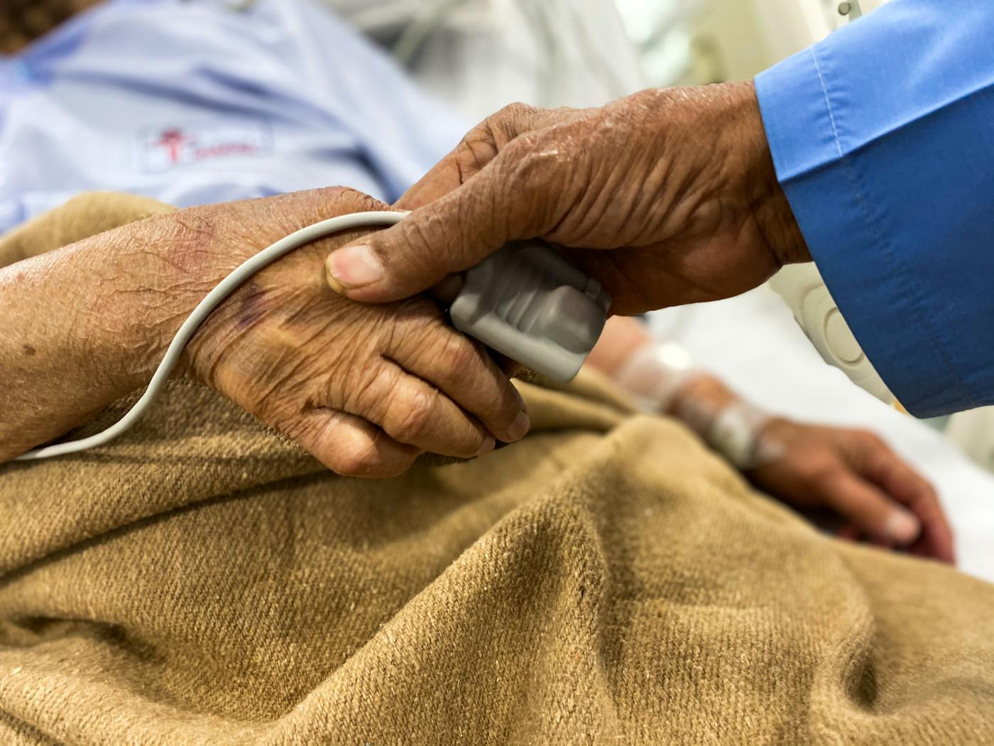 Gentle hand holding during recovery care